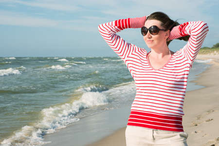   Woman walking on the sea  の写真素材