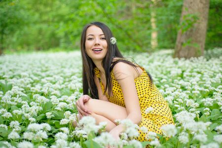 Woman among the flowersの写真素材