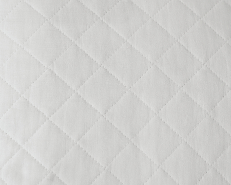 Quilted white natural textilesの写真素材