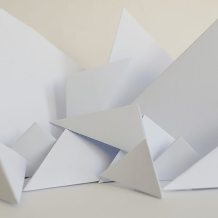 Abstract background of white paper trianglesの写真素材