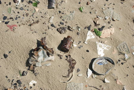 Old garbage in the sandの写真素材