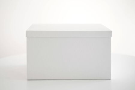 White cardboard box is on the tableの写真素材