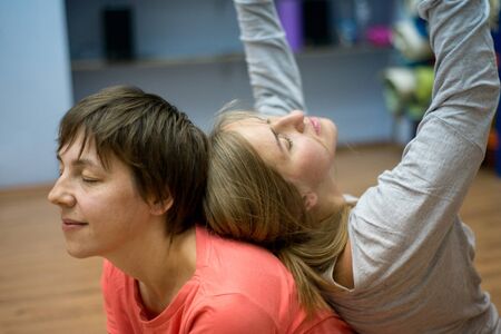 Two women dancing dance contact improvisationの写真素材