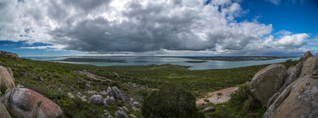 A beautiful vacation   holiday setting with islands by the calm ocean waters, a lagoon and blue skies  although itの写真素材