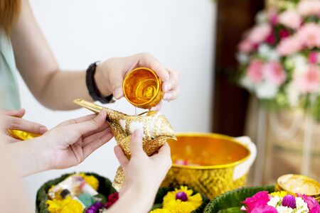 Water blessing wedding ceremony in Thailandの写真素材