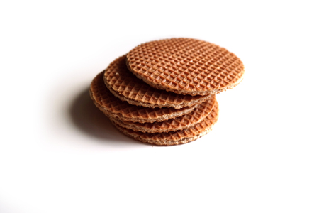 Dutch waffle syrup (treacle), on a white background.の写真素材