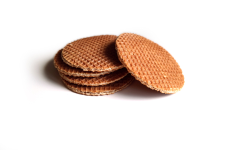 Dutch waffle syrup (treacle), on a white background.の写真素材