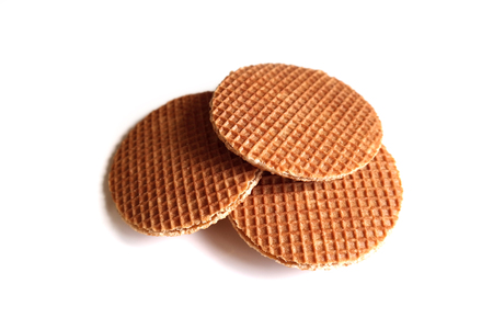 Dutch waffle syrup (treacle), on a white background.の写真素材