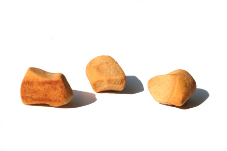 Pepper Nuts (gingerbread), a Dutch holiday / Sinterklaas snack, on whiteの写真素材