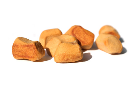 Pepper Nuts (gingerbread), a Dutch holiday / Sinterklaas snack, on whiteの写真素材