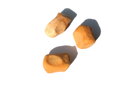 Pepper Nuts (gingerbread), a Dutch holiday / Sinterklaas snack, on whiteの写真素材