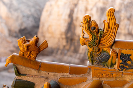 Chinese style dragon statue on the wall of Chinese temple, Thailand.の写真素材