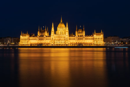 Hungarian Parliament building at night in Budapest, Hungary. View from Danube river.の写真素材