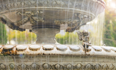 stone fountain splashesの写真素材
