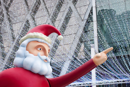 BANGKOK,THAILAND - DEC 1ST,2017 : Chrismas decoration Santa Claus doll , lighting blue and white background In front of Central World Department Store, Bangkok, Thailand on dec 1st,2017のeditorial素材