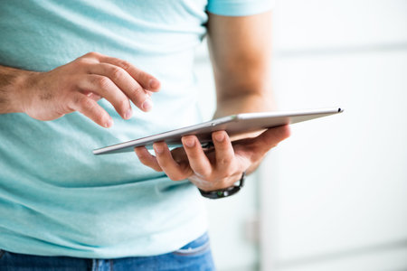 Man working with tablet computerの写真素材