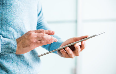 Man working with tablet computer