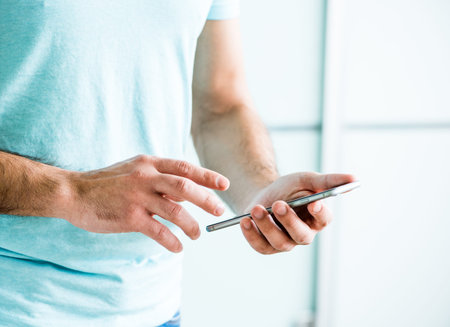 Man working with big smart phone