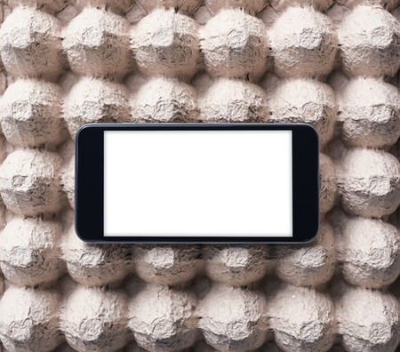 Black smart phone with isolated screen. Clipping path included.の写真素材