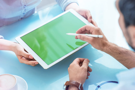 People working with tablet pcの写真素材