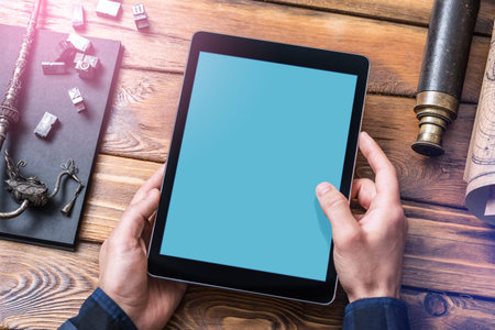 Man working with a digital tablet PC. Closeup