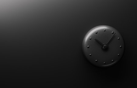 Black wall clock with minimalistic design on a black wall.の写真素材