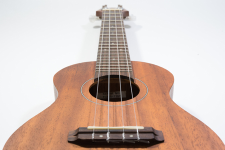 Classic wooden ukulele with four nylon string this is a wonderful musical instrument unplugの写真素材
