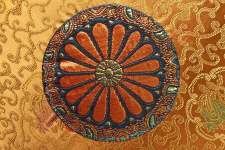 Patterned silk is woven into the colorful and vibrantの写真素材