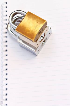 locks on white book の写真素材