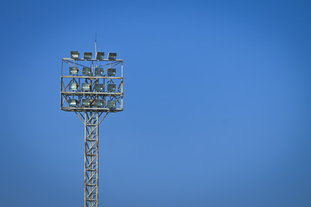 Spot-light tower on blue skyの写真素材