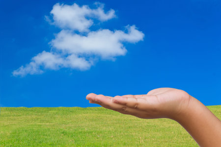 hand and cloud blue skyの写真素材