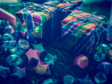 Close up gift box  on green grass background for Christmas and New year. Copy spaceの写真素材