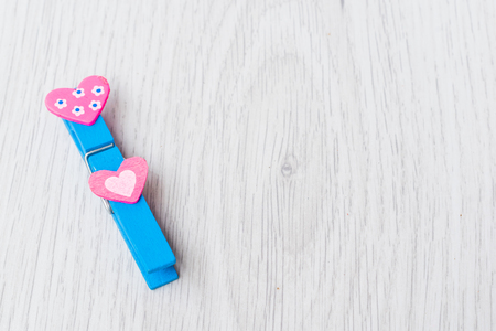 Colored heart shaped clothespins valentine day canceptの写真素材