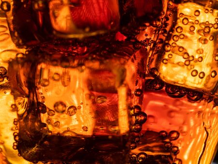 Cola With Ice And Bubbles In The Glass. Close Up Soda Soft Drinkの写真素材