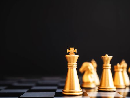 Chess board game staying against full set of chess pieces. Strategy, Planning and Decision business conceptの写真素材