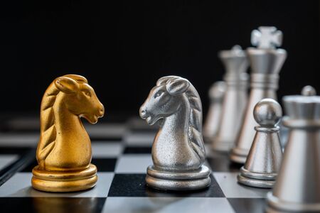 Chess game staying against full set of chess pieces. Strategy, Planning and Decision business conceptの写真素材