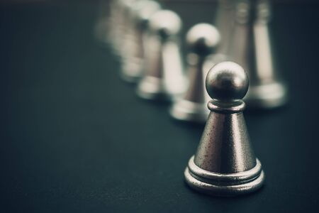 Chess board game staying against full set of chess pieces. Strategy, Planning and Decision business conceptの写真素材