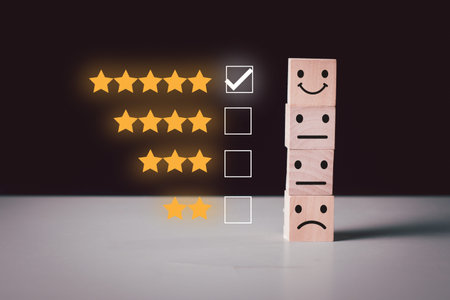 Best excellent smiley face business services rating customer experience.Evaluation and satisfaction survey concept.five star on top wood block cubeの写真素材