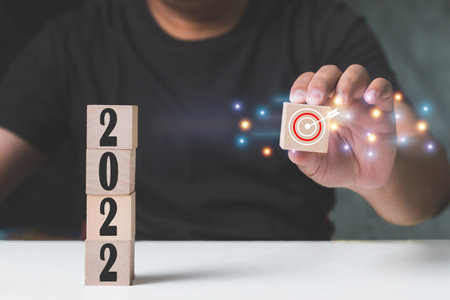 New year 2022 and goal or target icon. concept of New year Business goals and vision, mobile stick with new year 2022 and goals, goal concept and new year business visionの写真素材