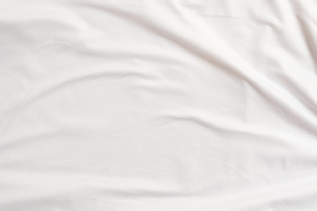 Closeup rippled soft white fabric texture background