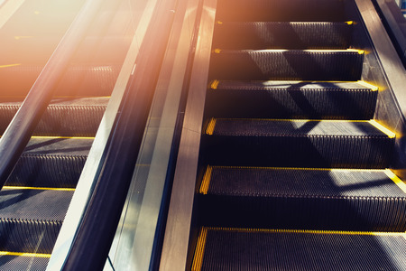 The image of the escalator used to travel between layers. Is energy waste Passenger Transport Conceptの写真素材