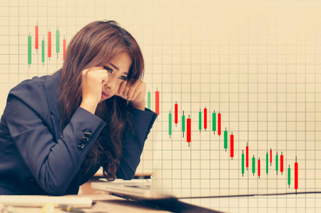 Businesswoman regrets investment slump.Business concept.