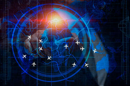 Control the technology by touching the screen. Simulation screen showing various flights for transportation and passengers.の写真素材