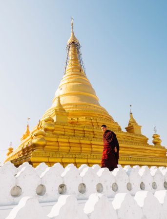 monk walking pass stupaのeditorial素材