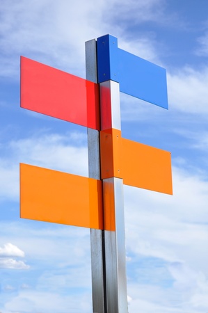 multi color road sign with cloudy sky on の写真素材