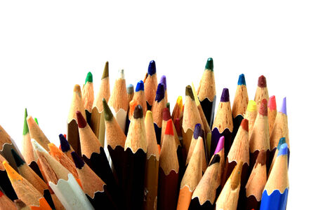 Assortment of multi colored pencils on white の写真素材