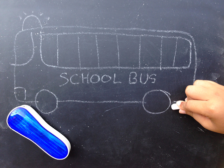 Chalkboard drawing of school bus.の写真素材