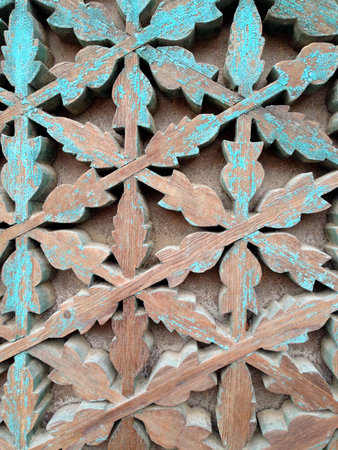 Pattern of flower carved on old wood backgroundの写真素材