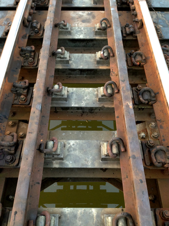 railway going across over through the river.の写真素材