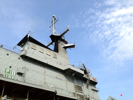 Radar on battleship with blue sky backgroundの写真素材